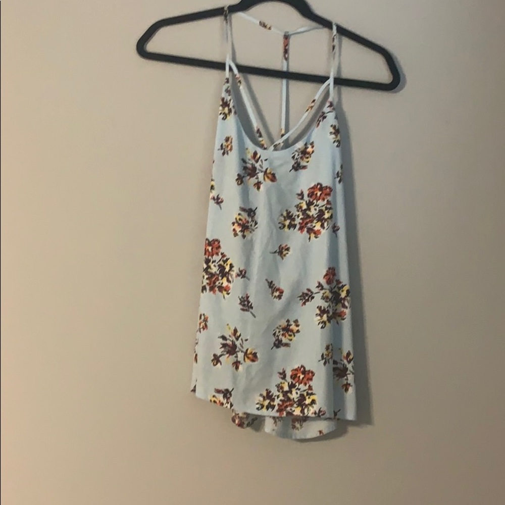baby blue top with flower design